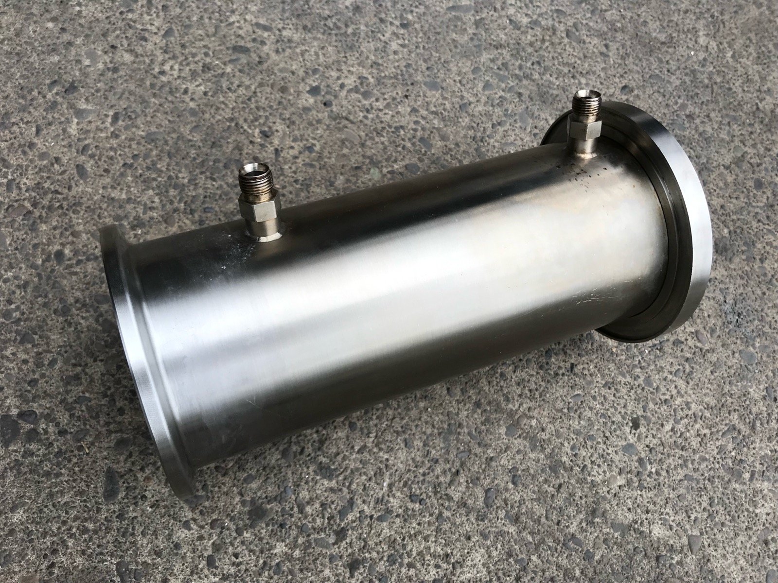 Hemp processing equipment cleaning showing restored stainless steel finish